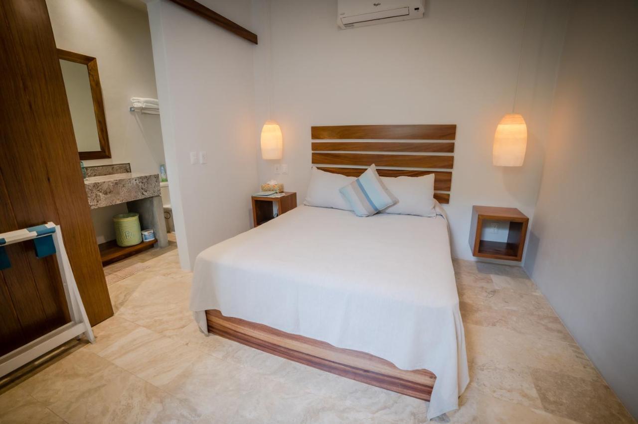Anjali Casa Divina Hotel ซายูลิตา ภายนอก รูปภาพ